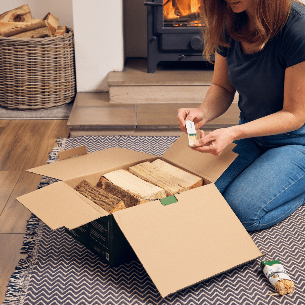 Start kit contains kiln dried hardwood logs and 2 KIndleFlamers natural firelighters