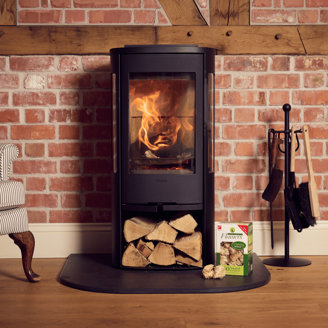 Flamers natural firrelighters 50 pack in front of eco design stove