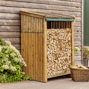 kiln dried logs stacked in a certainly wood log store