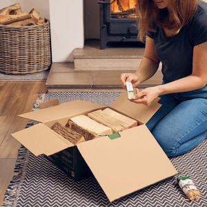 Start kit contains kiln dried hardwood logs and 2 KIndleFlamers natural firelighters