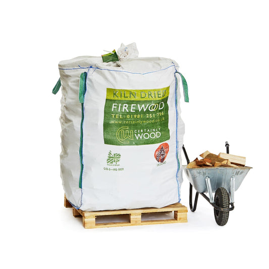 Bag of kiln-dried firewood with a wheelbarrow on a white background