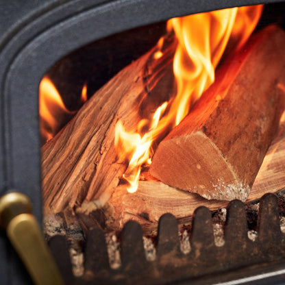 Wood burning in a fireplace with flames