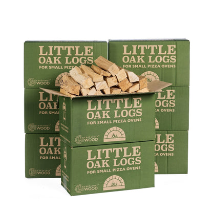 Green boxes of Little Oak Logs for small pizza ovens with logs inside on a white background